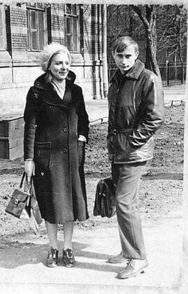 Before rising to power as one of the most infamous leaders in the world, Putin was a playful, hipster-dressing man in love. circa 1970, Russia: A young VLADIMIR PUTIN with his mother. St. Petersburg Russia - ZUMAz03_ 19730301_smk_z03_788 Copyright: xRussianxArchivesx