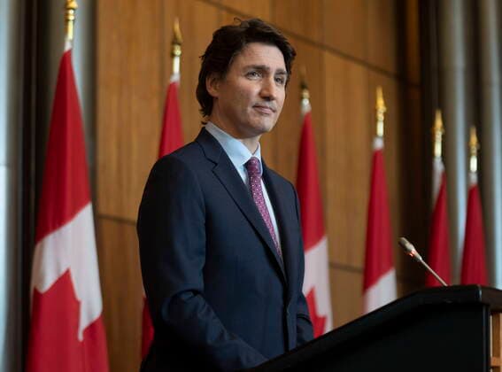 February 25, 2022, Ottawa, ON, Canada: Prime Minister Justin Trudeau listens to a question from a reporter during a news conference, in Ottawa, Friday, Feb. 25, 2022. Ottawa Canada  - ZUMAc35_ 20220225_zaf_c35_054 Copyright: xAdrianxWyldx