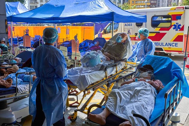 March 1, 2022, Hong Kong, China: Covid-19 patients laying on beds outside the Caritas Medical Center in Hong Kong. Hong Kong hospitals are overwhelmed as the city is facing its worst-ever coronavirus outbreak. Hong Kong China - ZUMAs197 20220301_zaa_s197_058 Copyright: xEmmanuelxSernax