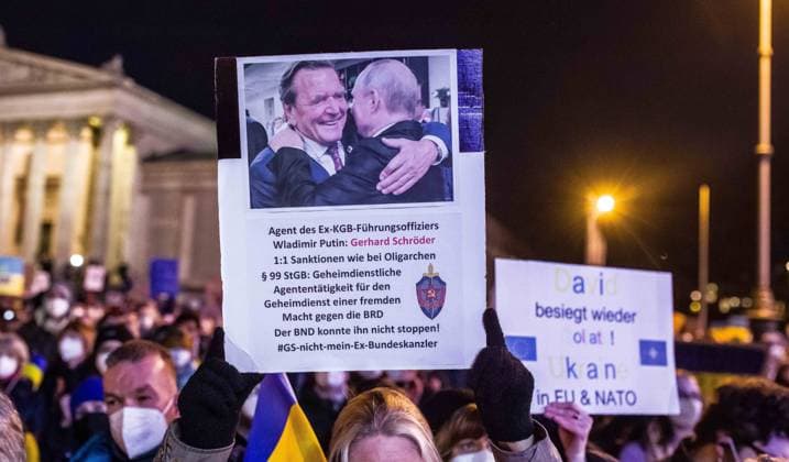 March 2, 2022, Munich, Bavaria, Germany: References to former German Chancellor Gerhard Schroeder who is the subject of increasing calls for international sanctions. Schroeder is often discussed in the course of this conflict as the true chancellor of Germany due to his pro-Putin influence on the SPD. Feeling a duty to denounce war due to the city s role in the rise of the Third Reich, 45,000 assembled at Koenigsplatz in Munich, Germany to protest the invasion of Ukraine by Russia and call for solidarity with the Ukrainian people, with refugees, People of Color who are being blocked by Ukrainian and Polish police, and for a united Europe against the threat of an increasingly unhinged Putin. Munich Germany - ZUMAb160 20220302_zbp_b160_080 Copyright: xSachellexBabbarx