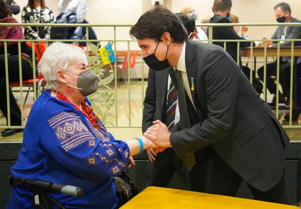 March 4, 2022, TORONTO, ON, CANADA: Canadian Prime Minister Justin Trudeau, right, greets Vera Kostecki and others from the Ukrainian community as Russia has launched a devastating attack and war on Ukraine in Toronto on Friday, March 4, 2022. TORONTO CANADA  - ZUMAc35_ 20220304_zaf_c35_029 Copyright: xNathanxDenettex