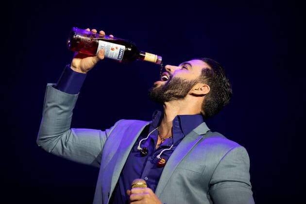 March 5, 2022, Porto, Portugal: Brazilian singer Gusttavo Lima, best known for his Sertanejo musical style, drinks a wine while performing at the SuperBock Arena, in Porto. Porto Portugal - ZUMAs197 20220305_zaa_s197_416 Copyright: xRitaxFrancax