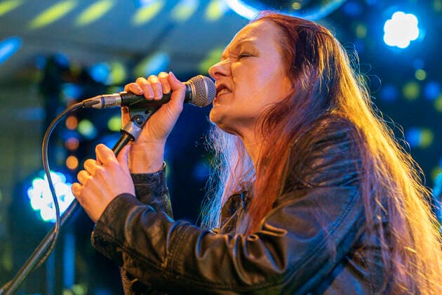 People show support for Ukraine at live music fundraiser Rock Paper Sister performing at the Ukrainian Refugee Fundraiser at the Brudenell Social Club, Leeds, UK Leeds Brudenell Social Club West Yorkshire United Kingdom Copyright: xIamxBurn NewsxImagesx