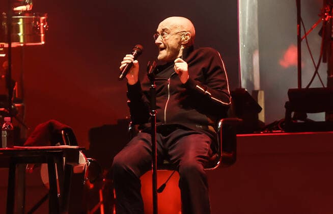 Concert by Genesis, @ Mercedes Arena, Berlin Genesis, vocals Phil Collins keyboard Tony Banks bass, guitar Mike Rutherford drums live Nicholas Nic Collins