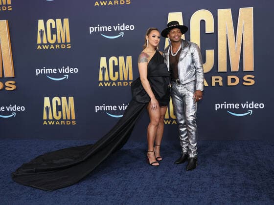 Alexis Gale and country singer Jimmie Allen arrive for the 2022 Academy of Country Music Awards at Allegiant Stadium in Las Vegas, Nevada on Monday, March 7, 2022.  LAV20220307035 JAMESxATOA