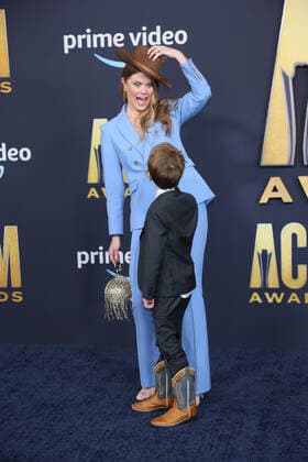 Songwriter Nicolle Galyon with her son Ford Clawson arrive for the 2022 Academy of Country Music Awards at Allegiant Stadium in Las Vegas, Nevada on Monday, March 7, 2022.  LAV20220307037 JAMESxATOA
