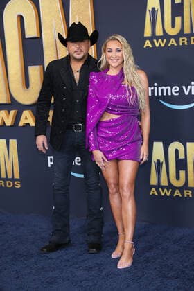 Country artist Jason Aldean and Brittany Aldean arrive for the 2022 Academy of Country Music Awards at Allegiant Stadium in Las Vegas, Nevada on Monday, March 7, 2022.  LAV20220307070 JAMESxATOA