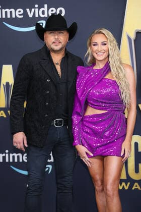 Country singer Jason Aldean and Brittany Aldean arrive for the 2022 Academy of Country Music Awards at Allegiant Stadium in Las Vegas, Nevada on Monday, March 7, 2022.  LAV20220307071 JAMESxATOA