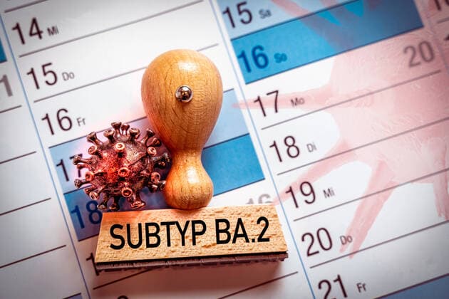 08 March 2022: stamp on a calendar labeled subtype B A 2 omicron variant, mutation of Corona virus Covid 19 PHOTOMONTAGE