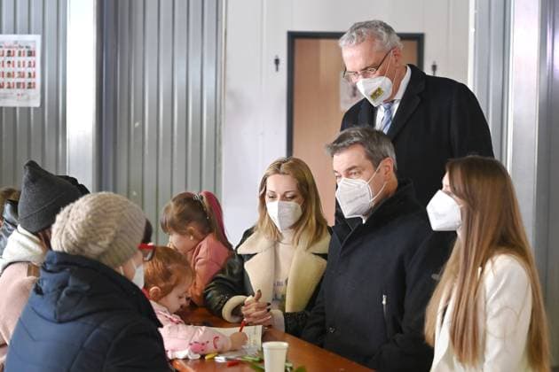 State President Dr Markus Soeder and Bavarias Interior Minister Joachim Herrmann visit arrival center in Munich on 08 03 2022 Bavaria one of the main access camps for war refugees from Ukraine
