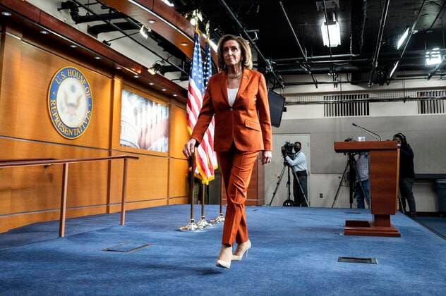 March 9, 2022, Washington, DC, United States: March 9, 2022 - Washington, DC, United States: U.S. House Speaker NANCY PELOSI (D-CA) wearing a pin with the flag of Ukraine on it as she leaves her weekly conference. Washington United States - ZUMAb161 20220309_zap_b161_025 Copyright: xMichaelxBrochsteinx