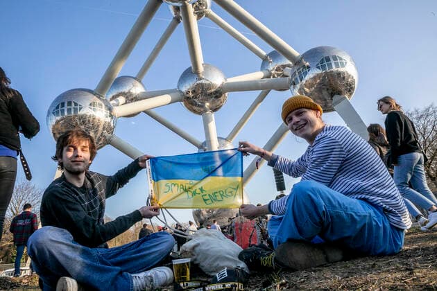 People attend the benefit festival UnitedForUkraine organized by the Brussels nightclubs, events sector and festivals, in Brussels, Thursday 10 March 2022.  HATIMxKAGHAT 20146465