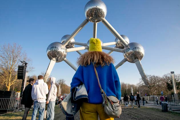 People attend the benefit festival UnitedForUkraine organized by the Brussels nightclubs, events sector and festivals, in Brussels, Thursday 10 March 2022.  HATIMxKAGHAT 20151443