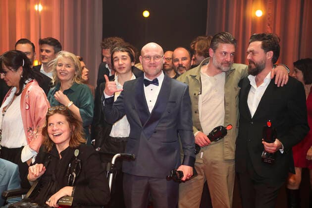 actor Jeroen Perceval (C) and actor Geert Van Rampelberg pictured during the award ceremony of the Ensors Flemish film prizes at the 14th Film Festival Oostende , Saturday 12 March 2022, in Oostende.  NICOLASxMAETERLINCK 21216609