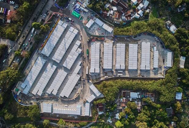 (220314) -- HONG KONG, March 14, 2022 () -- Aerial photo taken on March 12, 2022 shows the newly-built community isolation facility located in Fanling, south China s Hong Kong. The fourth community isolation facility (CIF) in Hong Kong constructed with the support from the China mainland has been put into operation after it was handed over to the Hong Kong Special Administrative Region (HKSAR) government. The newly-built CIF provides over 350 rooms with more than 1,000 beds for emergency isolation. () CHINA-HONG KONG-COVID-19-MAINLAND-AIDED ISOLATION FACILITY (CN) xinhua 