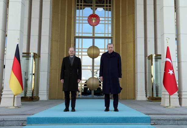 Turkish President Recep Tayyip Erdogan, right, and Germany s Chancellor Olaf Scholz review a military honour guard during a ceremony in Ankara, Turkey, Monday, March 14, 2022. ( Copyright: DepoxPhotos 17461376
