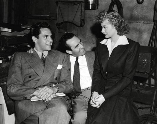 Desi Arnaz, Producer Harold Lloyd, Lucille Ball, A Girl, a Guy, and a Gob (1941) RKO Radio Pictures. File Reference 34145-634THA  Copyright: xCinemaxLegacyxCollection ThexHollywoodxArchivex 34145-634THA