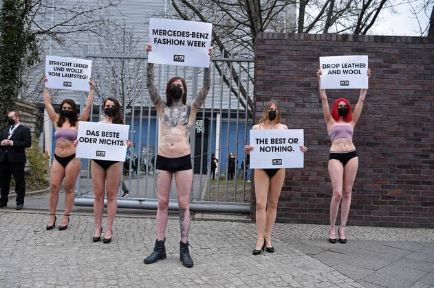Demonstrators at the Mercedes Benz Fashion Week Opening Show of Sofia Ilmonen at Kraftwerk in Berlin on 14 03 2022