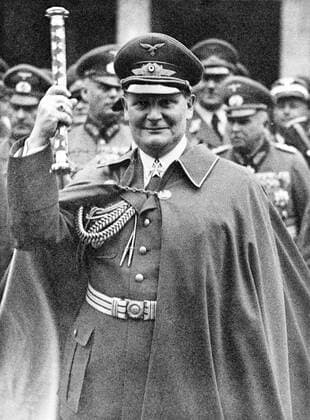Hermann Wilhelm Goering (12 January 1893 15 October 1946) was a German politician, military leader, and leading member of the Nazi Party (NSDAP).<br ><br > After helping Adolf Hitler take power in 1933, he became the second-most powerful man in Germany. He founded the Gestapo in 1933, and later gave command of it to Heinrich Himmler. Göring was appointed commander-in-chief of the Luftwaffe (air force) in 1935, a position he held until the final days of World War II.<br ><br > After World War II, Göring was convicted of war crimes and crimes against humanity at the Nuremberg trials. He was sentenced to death by hanging, but committed suicide by ingesting cyanide the night before the sentence was to be carried out. Supplier:xCPAxMediaxCo.xLtd. 1060_05_CPA0032349