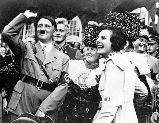 Helene Bertha Amalie Leni Riefenstahl (22 August 1902 8 September 2003) was a German film director, producer, screenwriter, editor, photographer, actress, dancer, and propagandist for the Nazis.<br ><br > Adolf Hitler (20 April 1889 30 April 1945) was a German politician of Austrian origin who was the leader of the Nazi Party (NSDAP), Chancellor of Germany from 1933 to 1945, and Fuhrer ( leader ) of Nazi Germany from 1934 to 1945.<br ><br > As dictator of Nazi Germany he initiated World War II in Europe and was a central figure of the Holocaust. Supplier:xCPAxMediaxCo.xLtd. 1060_05_CPA0032361