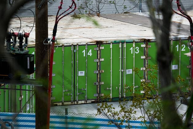 March 18, 2022, Hong Kong, China: Refrigerated containers are seen at the Fu Shan Public Mortuary. Hong Kong health authorities have set up refrigerated shipping containers outside a public mortuary to store dead bodies as mortuaries and hospitals are running out of space. Hong Kong China - ZUMAt141 20220318_zap_t141_002 Copyright: xKeithxTsujix