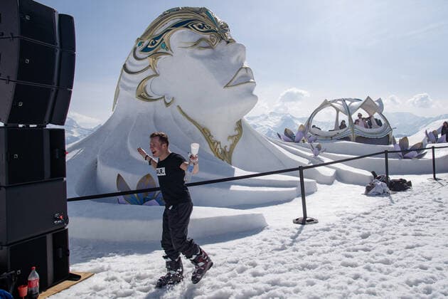 Illustration shows people enjoying the Crystal Garden stage at 2000 meters at the second edition of the Tomorrowland Winter 2022 music festival, Saturday 19 March 2022, in Alpe D Huez, France.  OLIVIERxVIN 23214725