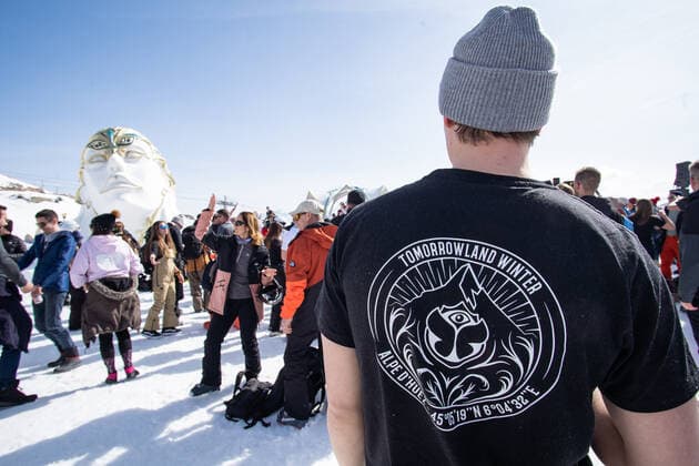 Illustration shows people enjoying the Crystal Garden stage at 2000 meters at the second edition of the Tomorrowland Winter 2022 music festival, Saturday 19 March 2022, in Alpe D Huez, France.  OLIVIERxVIN 23214847