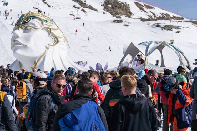 Illustration shows people enjoying the Crystal Garden stage at 2000 meters at the second edition of the Tomorrowland Winter 2022 music festival, Saturday 19 March 2022, in Alpe D Huez, France.  OLIVIERxVIN 23217010