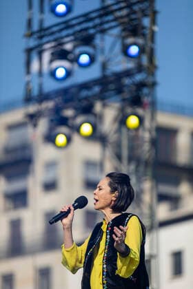, Natalia Klitschko sings the song Better Day Berlin Berlin Germany on stage at the Brandenburg Gate at the Peace of Love concert with Daniel Leon