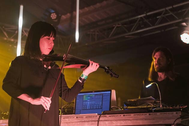 March 21, 2022, Southampton, Hampshire, United Kingdom: Japanese born violinist, composer and performer Yamane Hoshiko (L), currently residing in Berlin, on stage with German electronic band Tangerine Dream founded in 1967, performing live at the Engine Rooms, Southampton. Southampton United Kingdom - ZUMAs197 20220321_zaa_s197_179 Copyright: xDawnxFletcher-Parkx