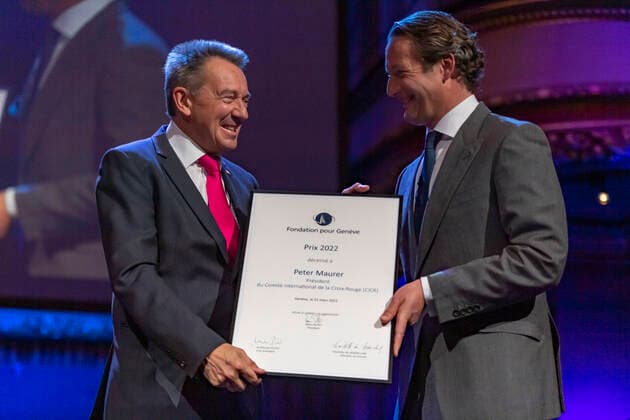 Switzerland: Foundation Award Ceremony for Geneva 2022 Peter Maurer (President of ICRC) (L) receives the Foundation Prize for Geneva for his work with the International Committee of the Red Cross, from the hand of the Marc Pictet (Director of the Pictet group) (R) during the Foundation Award Ceremony for Geneva 2022. Geneva Switzerland Switzerland Copyright: EricxDubost