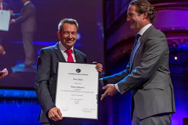 Switzerland: Foundation Award Ceremony for Geneva 2022 Peter Maurer (President of ICRC) (L) receives the Foundation Prize for Geneva for his work with the International Committee of the Red Cross, from the hand of the Marc Pictet (Director of the Pictet group) (R) during the Foundation Award Ceremony for Geneva 2022. Geneva Switzerland Switzerland Copyright: EricxDubost