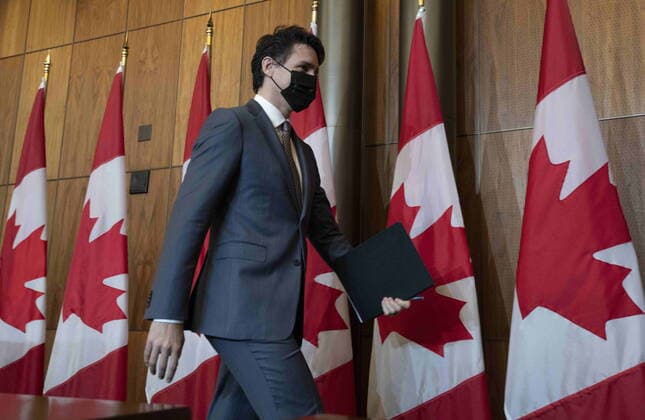 March 22, 2022, Ottawa, ON, Canada: Prime Minister Justin Trudeau leaves a news conference, Tuesday, March 22, 2022 in Ottawa. Ottawa Canada  - ZUMAc35_ 20220322_zaf_c35_006 Copyright: xAdrianxWyldx