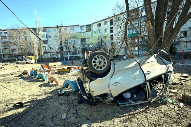 SIEVIERODONETSK, UKRAINE - MARCH 21, 2022 - An overturned car is seen in the yard of an apartment building after the shelling of Russian troops in Sievierodonetsk, Luhansk Region, eastern Ukraine. Sievierodonetsk during Russian invasion  Copyright: xAlbertxKoshelevx