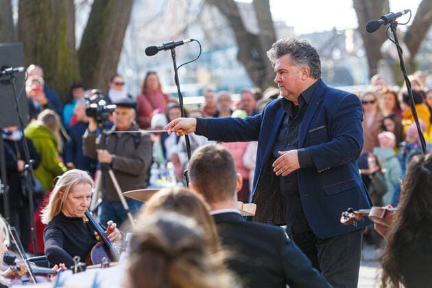 UZHHOROD, UKRAINE - MARCH 25, 2022 - A conductor Viktor Ploskina directs the performance of the Academic Symphony Orchestra of the Philharmonia during the concert in support of the Armed Forces of Ukraine, Uzhhorod, western Ukraine Concert in support of Ukrainian Armed Forces held in Uzhhorod  Copyright: xSerhiixHudakx
