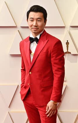 Simu Liu arrives for the 94th annual Academy Awards at the Dolby Theatre in the Hollywood section of Los Angeles on Sunday, March 27, 2022.  LAP20220327286 JIMxRUYMEN