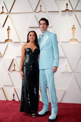 OscarÂ® nominee Kodi Smit-McPhee and guest arrive on the red carpet of the 94th OscarsÂ® at the Dolby Theatre at Ovation Hollywood in Los Angeles, CA, on Sunday, March 27, 2022.  Copyright: xx 34342-418THA