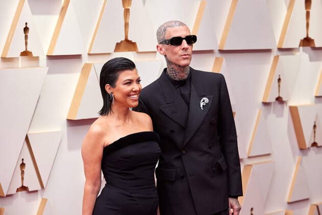 Kourtney Kardashian and Travis Barker arrive on the red carpet of the 94th OscarsÂ® at the Dolby Theatre at Ovation Hollywood in Los Angeles, CA, on Sunday, March 27, 2022.  Copyright: xx 34342-581THA