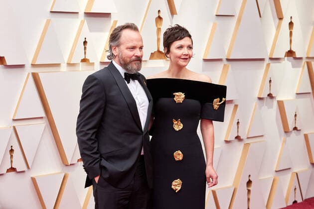 OscarÂ® nominee Maggie Gyllenhaal (right) and Peter Sarsgaard arrive on the red carpet of the 94th OscarsÂ® at the Dolby Theatre at Ovation Hollywood in Los Angeles, CA, on Sunday, March 27, 2022.  Copyright: xx 34342-593THA