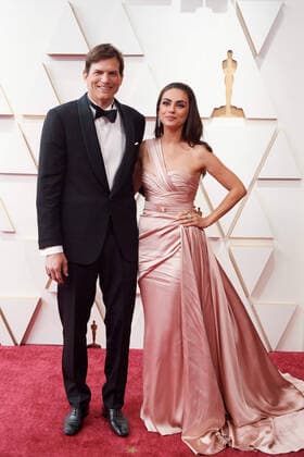 Ashton Kutcher and Mila Kunis arrive on the red carpet of the 94th OscarsÂ® at the Dolby Theatre at the Ovation Hollywood in Los Angeles, CA, on Sunday, March 27, 2022.  Copyright: xx 34342-795THA