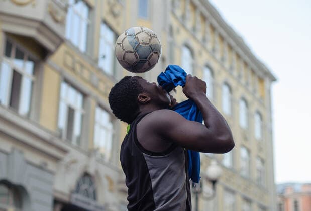 MOSCOW, RUSSIA - August 15, 2017 Black man juggles with a football on his head, model released, , property released, , 33546096.jpg, soccer, football, juggling, player, man, one, background, white, ball, silhouette, freestyle, people, person, black, sports, jersey, players, male, shadow, full, length, competitive, juggle, juggles, sport, field, brazilian, african, technique, summer, outdoor, young, professional