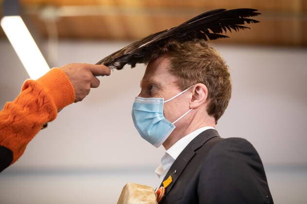 March 30, 2022, WILLIAMS LAKE, BC, CANADA: Minister of Crown Indigenous Relations Marc Miller is touched with eagle feathers by David Archie during a brushing ceremony while being welcomed at the Williams Lake First Nation, in Williams Lake, B.C., on Wednesday, March 30, 2022. WILLIAMS LAKE CANADA  - ZUMAc35_ 20220330_zaf_c35_070 Copyright: xDarrylxDyckx