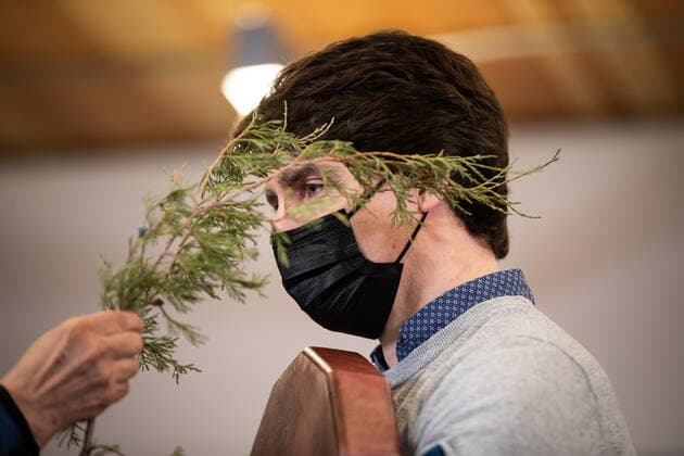 March 30, 2022, WILLIAMS LAKE, BC, CANADA: Prime Minister Justin Trudeau is touched with cedar by Charlene Belleau during a brushing ceremony while being welcomed at the Williams Lake First Nation, in Williams Lake, B.C., on Wednesday, March 30, 2022. WILLIAMS LAKE CANADA  - ZUMAc35_ 20220330_zaf_c35_072 Copyright: xDarrylxDyckx