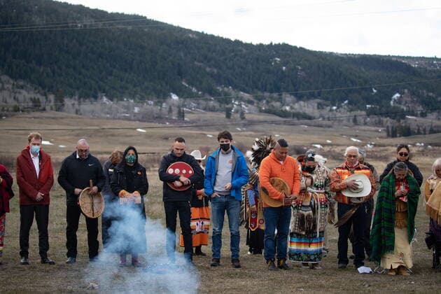 March 30, 2022, WILLIAMS LAKE, BC, CANADA: Prime Minister Justin Trudeau, centre, stands with Williams Lake First Nation Chief Willie Sellars, centre left, during a moment of silence on the former grounds of St. Josephs Mission Residential School, in Williams Lake, B.C., on Wednesday, March 30, 2022. In January, the Williams Lake First Nation announced it had identified 93 reflections that could indicate the number of children buried around the site of the former residential school. WILLIAMS LAKE CANADA - ZUMAc35_ 20220330_zaf_c35_106 Copyright: xDarrylxDyckx
