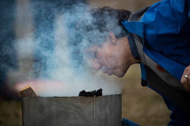 March 30, 2022, WILLIAMS LAKE, BC, CANADA: Smoke rises as Prime Minister Justin Trudeau helps Williams Lake First Nation Chief Willie Sellars start a ceremonial fire on the former grounds of St. Josephs Mission Residential School, in Williams Lake, B.C., on Wednesday, March 30, 2022. In January, the Williams Lake First Nation announced it had identified 93 reflections that could indicate the number of children buried around the site of the former residential school. WILLIAMS LAKE CANADA - ZUMAc35_ 20220330_zaf_c35_109 Copyright: xDarrylxDyckx