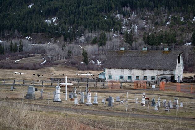 March 30, 2022, WILLIAMS LAKE, BC, CANADA: A cemetery and a barn are seen on the former grounds of St. Joseph s Mission Residential School, in Williams Lake, B.C., on Wednesday, March 30, 2022. In January, the Williams Lake First Nation announced it had identified 93 reflections that could indicate the number of children buried around the site of the former residential school. WILLIAMS LAKE CANADA - ZUMAc35_ 20220330_zaf_c35_131 Copyright: xDarrylxDyckx