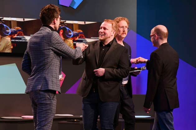 Alexander Reinhard Böhm, Oliver Eberlei, Uke Bosse and Simon Klein at the German Computer Game Award 2022 ceremony in the TonHalle Munich, 31 03 2022 Foto:xR.xHeinex xFuturexImage