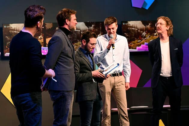 Uke Bosse with Simon Krätschmer and his team of A Jugglers Tale at the award ceremony of the German Computer Game Award 2022 in the TonHalle Munich, 31 03 2022 Foto:xR.xHeinex xFuturexImage