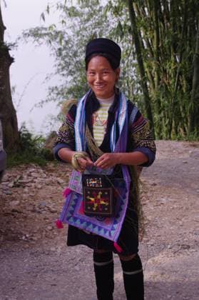 IMAGO Cultures of the world, Schwarze Hmong in Nordvietnam Black Hmong young women in the region of SAPA (North Vietnam). Hmong women still wear a dress. The Black Hmong women are dressed all in black. Dress, jacket and turban are black. It carries the traditional silver jewelry, earrings and necklace., model released, , 1900943.jpg, Female, woman, girl, ethnic, ethnicity, ethnically, ethnic group, minority, diversity, nation, rural, tribe, hill tribe, Hmong black, dress, jacket, turban, headdress, black, jewelry, earrings, clothing, clothes, embroidery, traditional, typical dress, customs, folklore, folk, fashion, tradition, ancestral, portrait, SAPA, Asia, Vietnam,