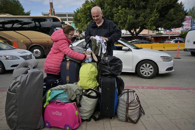 April 1, 2022, Tijuana, Baja California, Mexico: Vyacheslav, 65 from Kiev with his granddaughter arrive in Tijuana, Mexico at a impromptu camp established with other Ukrainian refugees waiting to get asylum into the United States near the San Ysidro Port of Entry on Friday, April 1, 2022. Tijuana Mexico - ZUMAm180 20220401_zip_m180_001 Copyright: xCarlosxA.xMorenox